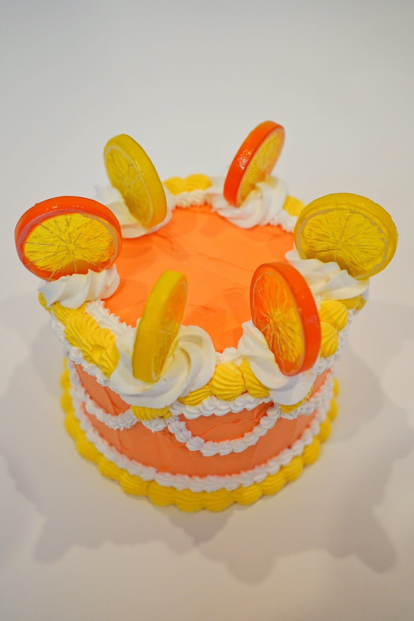 Vintage Medium Citrus Cake in Orange, Yellow and White with Fruit on Top