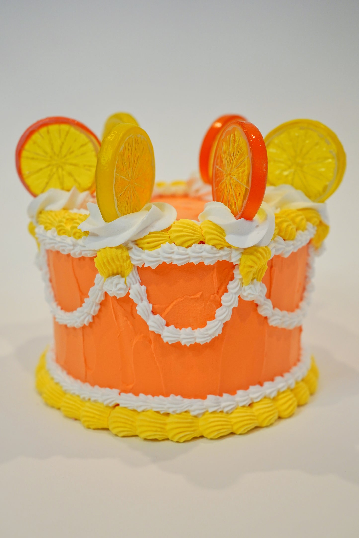 Vintage Medium Citrus Cake in Orange, Yellow and White with Fruit on Top