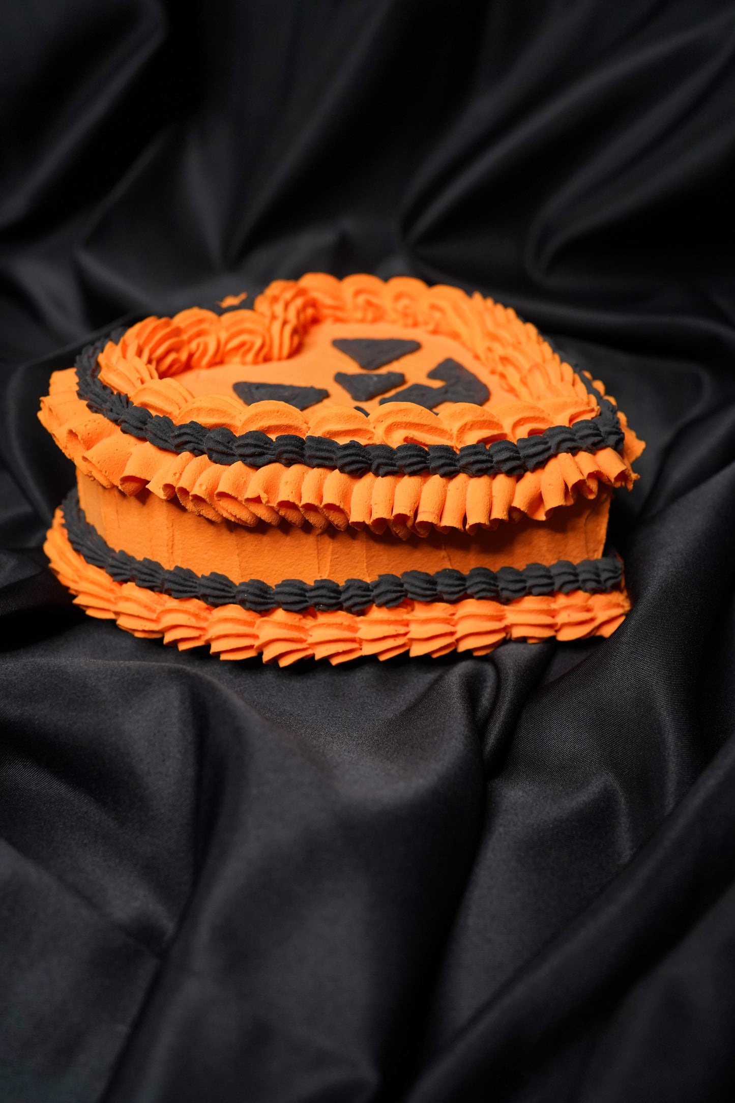 Medium Orange Heart Shaped Jack O Lantern Fake Cake