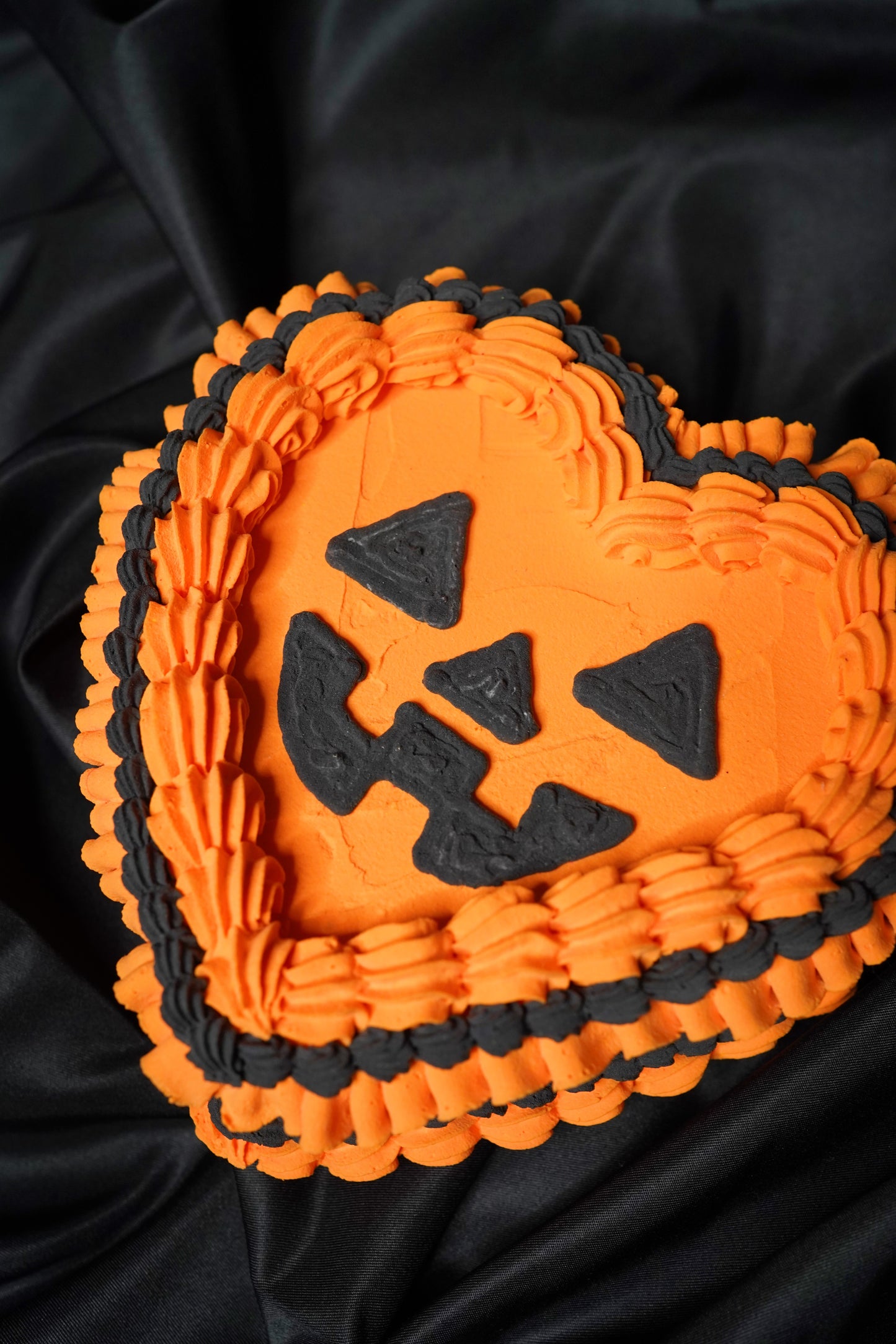 Medium Orange Heart Shaped Jack O Lantern Fake Cake