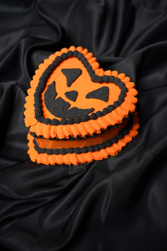 Small Orange Heart Shaped Jack O Lantern Fake Cake